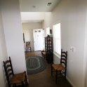 Hallway between bedroom wing and front door